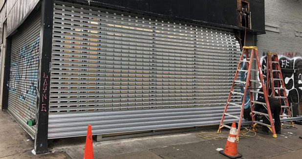 Store front shutter gate repair Monroe County